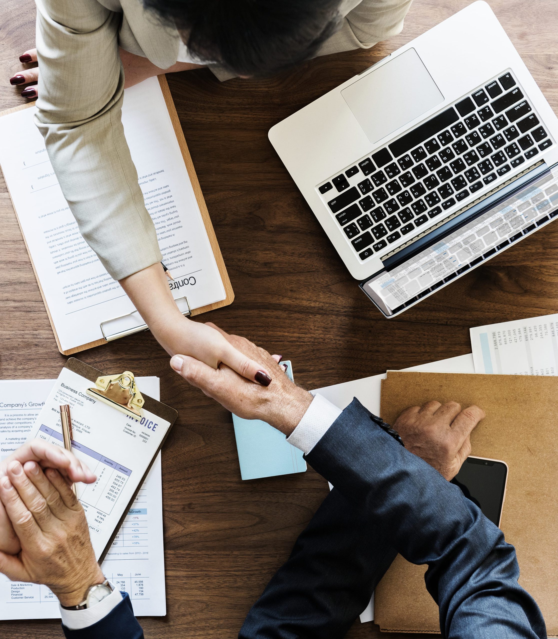 business-people-shaking-hands-together